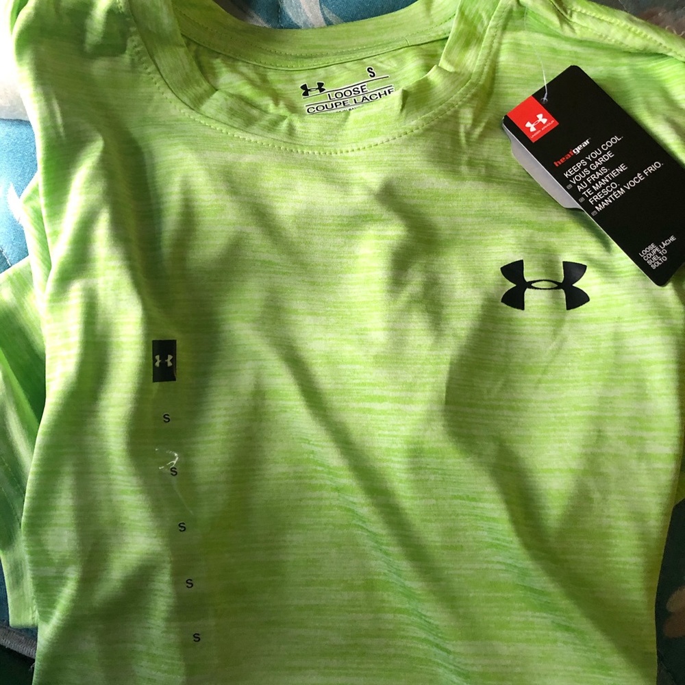 Under Amour shirt. Size small adult. Never worn